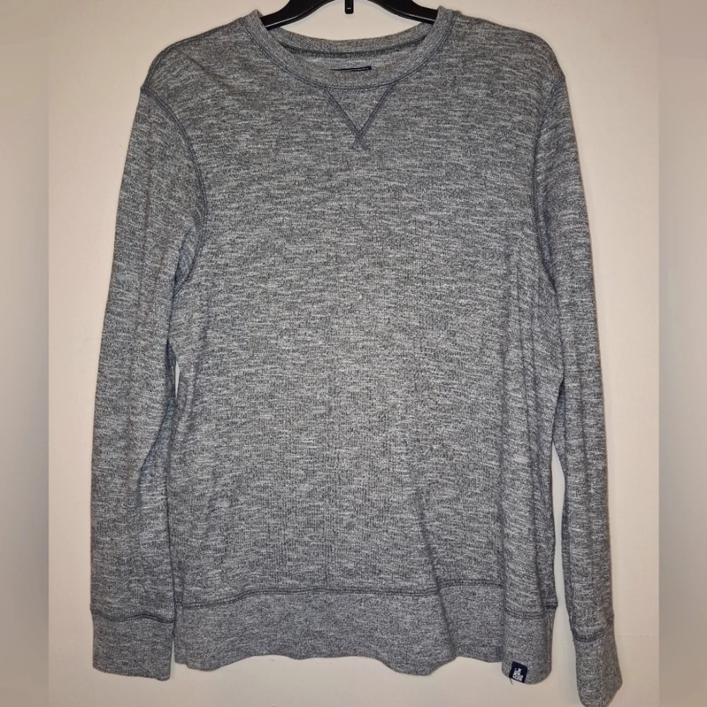A The North Face men's cotton sweatshirt in a size large. Pre-loved